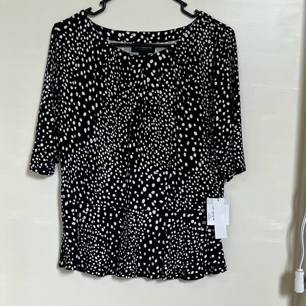 Black and white patterned peplum stretch blouse